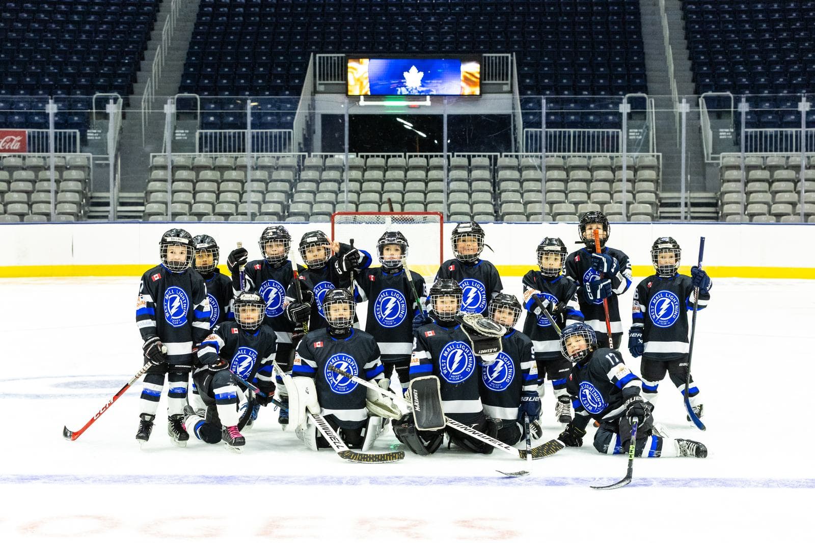 A full team roster gathered at centre ice for a team photo
