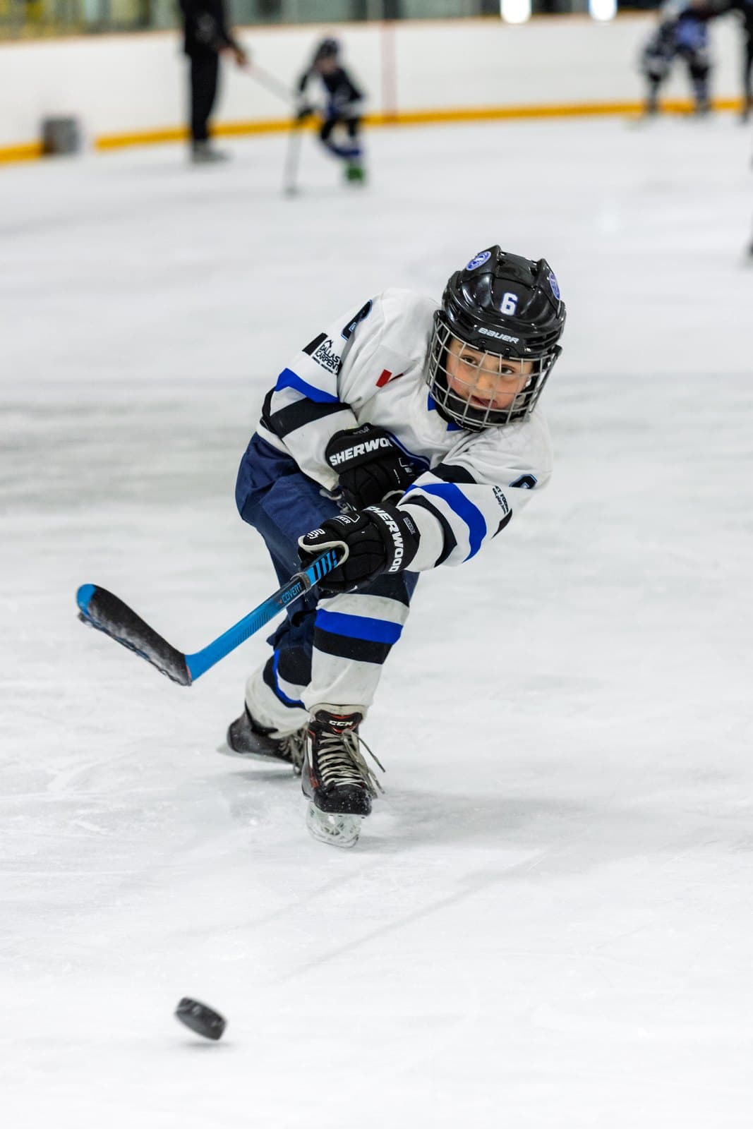 A one-timer from the circle, puck lifted off the ice