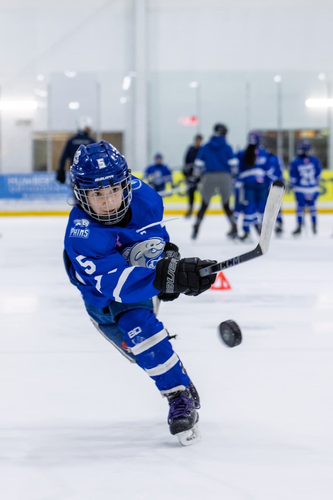 The moment of release, the puck already off the blade and moving