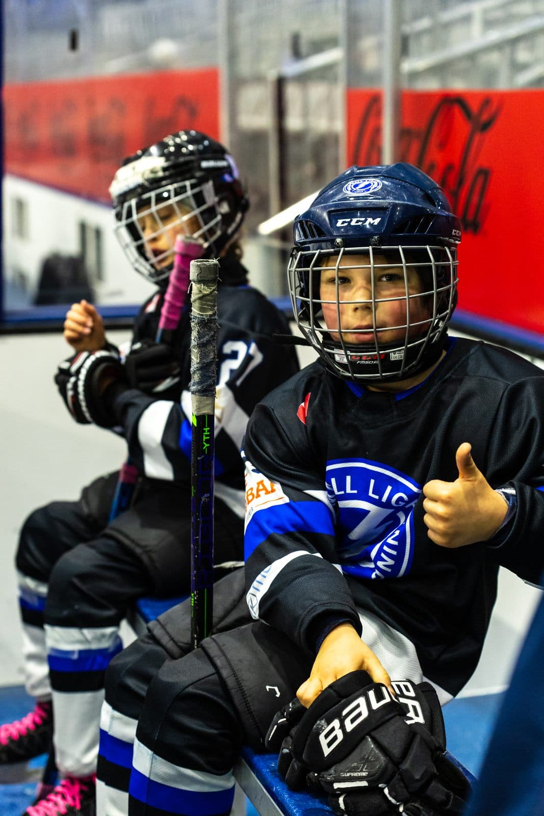 A player gives a thumbs up from the bench